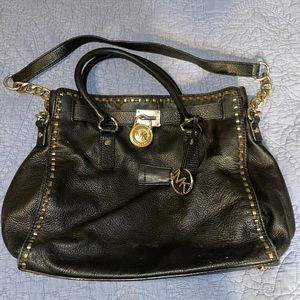 Michael Kors purse with lock and key decoration